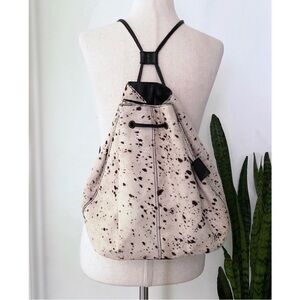 Silence + Noise Calf Hair Bucket Leather Backpack​